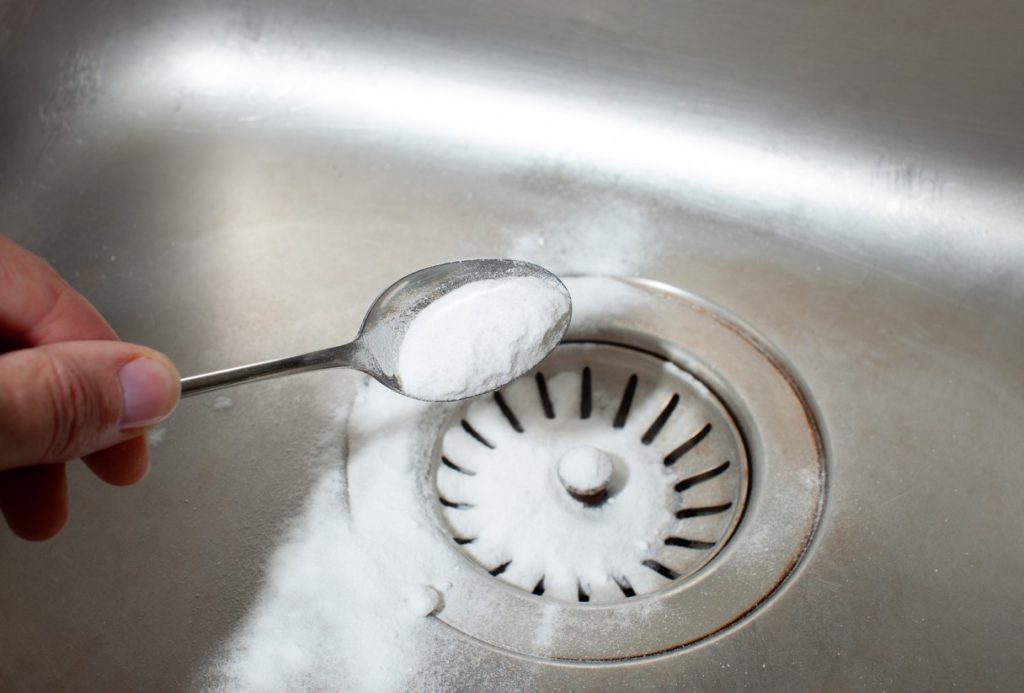 pour baking soda in kitchen sink